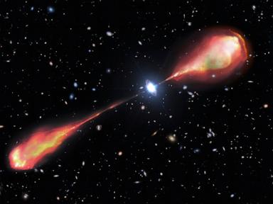 Telescopes spy a monster radio jet streaming from early object in the universe