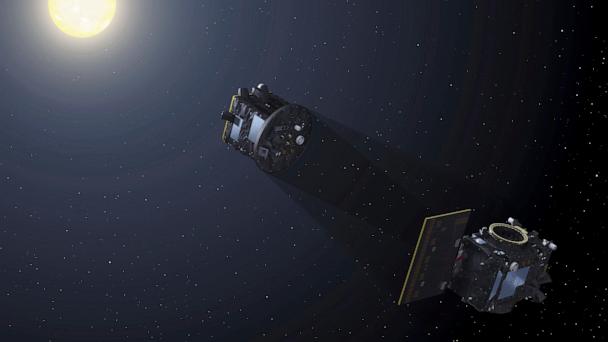 This image provided by the European Space Agency depicts the two spacecraft of the Proba-3 mission aligning to create an eclipse to capture a coronagraph in space. (P. Carril/ESA via AP)