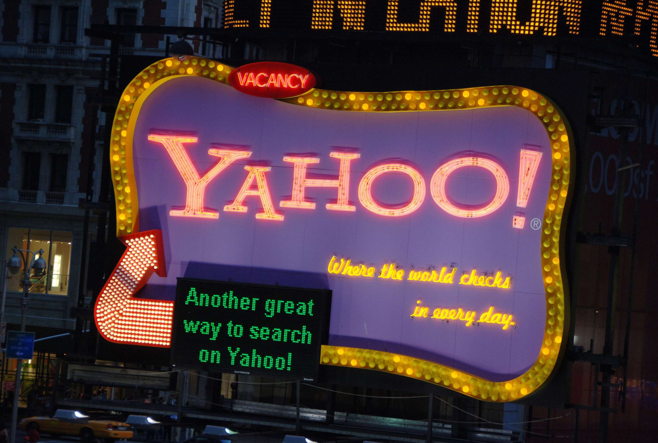 PHOTO: A Yahoo billboard lights up atop the Hard Rock Cafe Marquee in New York during an event to promote Yahoo Answers, June 13, 2006.