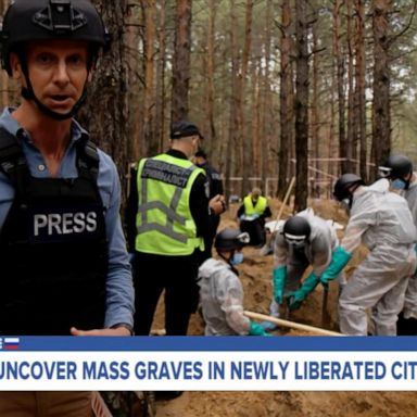 VIDEO: Ukrainians uncover mass graves in newly liberated city