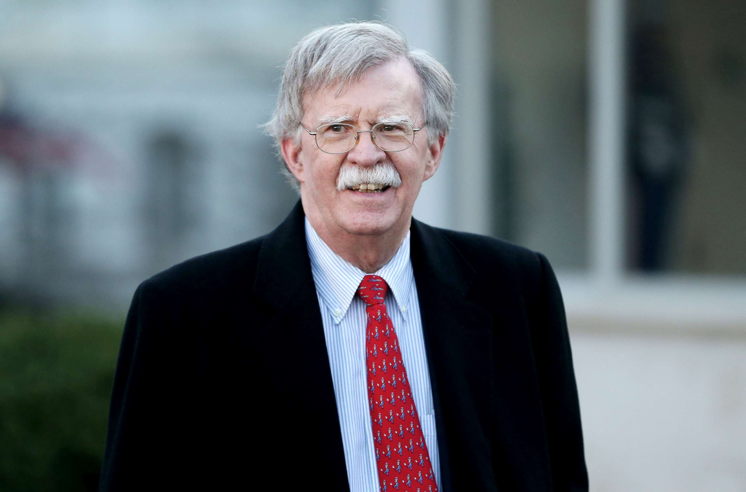 PHOTO: U.S. National Security Adviser John Bolton walks to an interview outside the White House in Washington, March 5, 2019.