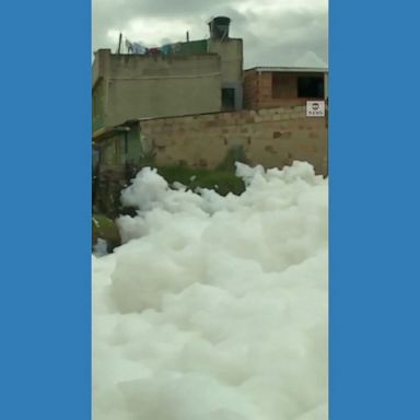 Clouds of toxic foam seen floating on Colombian river