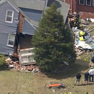 Emergency crews rushed to a chaotic scene Tuesday afternoon after a dump truck plowed into a home in New Jersey.