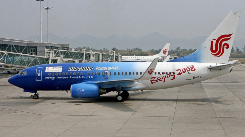 PHOTO: An Air China Boeing 737 jet painted to promote the Beijing 2008 Olympic Games, prepares to leave Chongqing airport, Aug. 20, 2006.