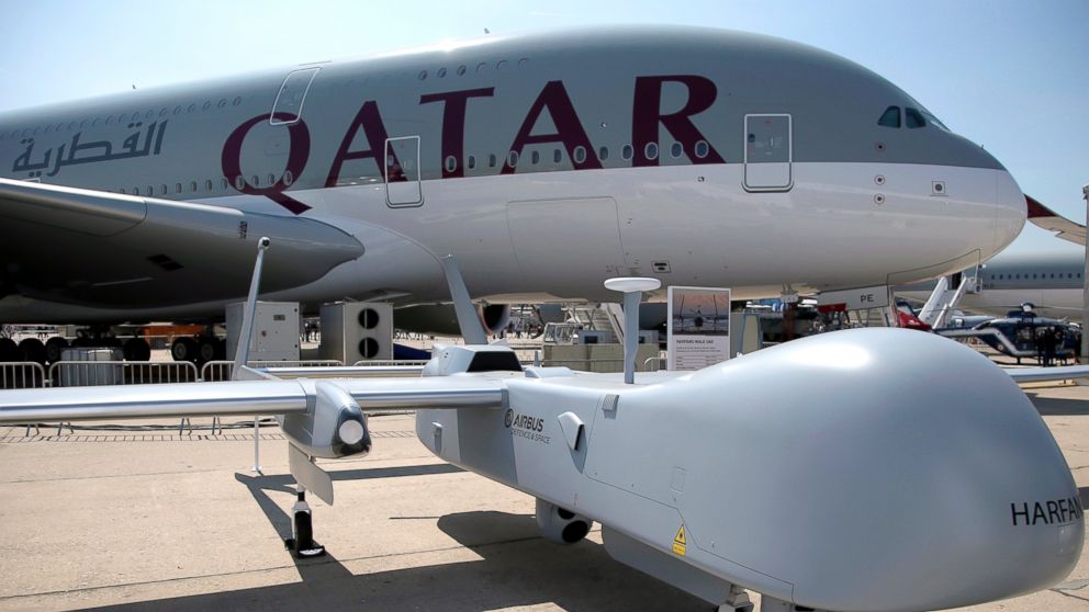 An Harfang Male UAS drone is displayed in front the Airbus A380 of Qatar Airways at the Paris Air Show, in Le Bourget airport, north of Paris, June 17, 2015.
