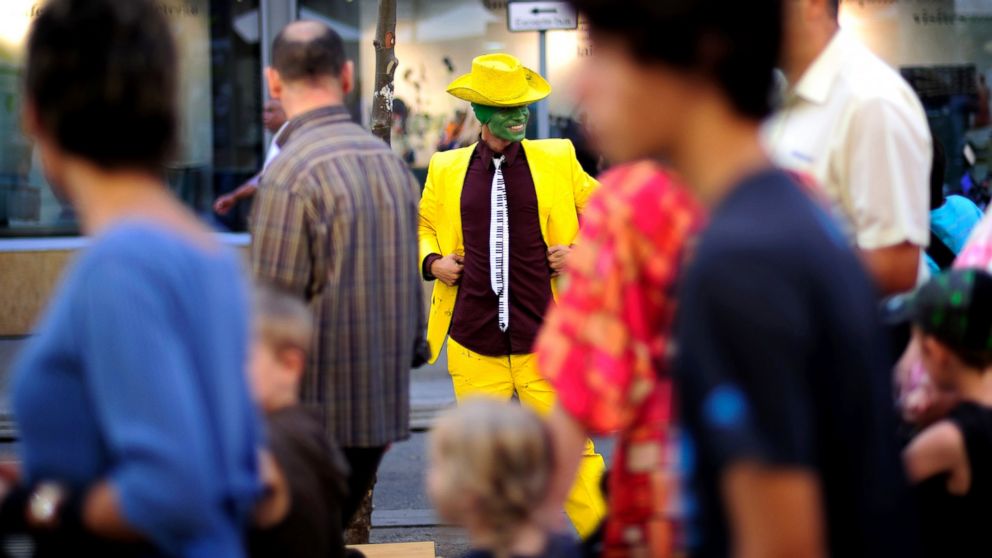 A man performs as human statue on La Ramblas St. in Barcelona, Spain, Oct. 29, 2009.