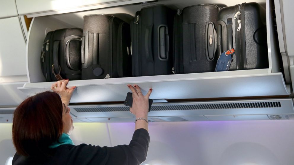 The hand baggage overhead bins in the cabin of a new Airbus A350X WB passenger plane on the tarmac at Munich Airport during a presentation of the new plane by Airbus officials, Feb., 27, 2015, in Munich.