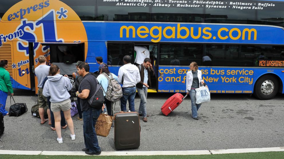 Passengers board a Megabus to New York in Washington, D.C., U.S., in this June 11, 2009, file photo.