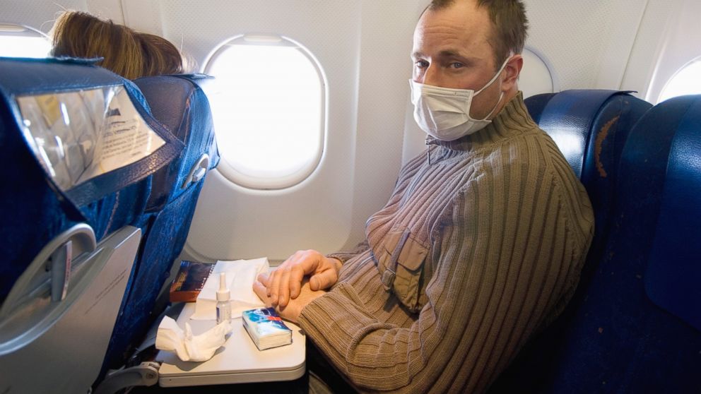Outside-air mixing replenishes the cabin air constantly, according to Boeing.com. But if you're seated next to a very sick passenger, you may feel inclined to wear a mask.