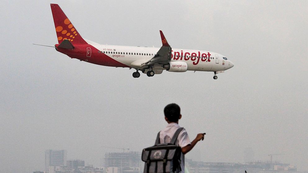 PHOTO: A SpiceJet Ltd. aircraft prepares to land at Chhatrapati Shivaji International Airport in Mumbai, India, Sept. 17, 2012. 