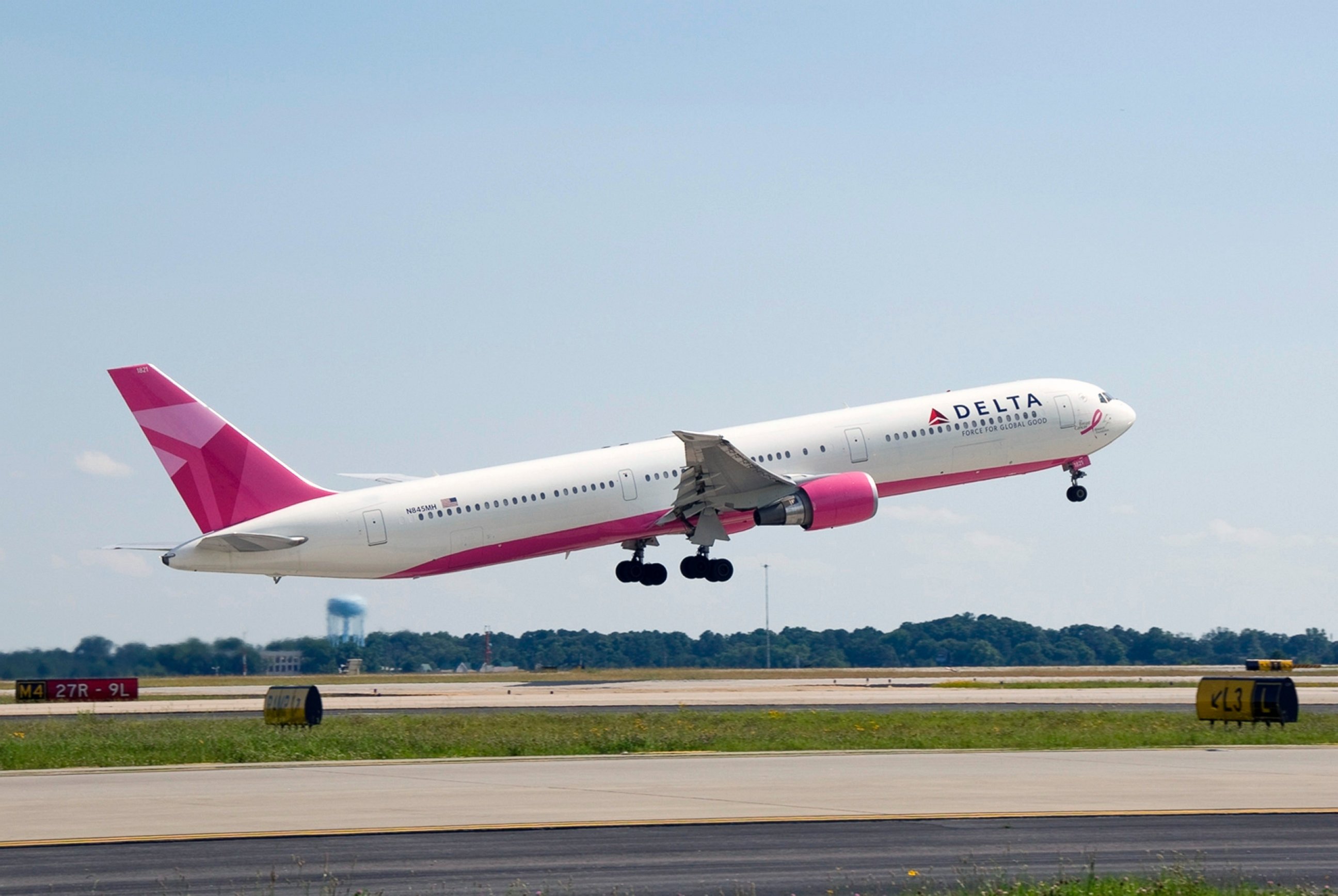 PHOTO: Delta Airlines paints an aircraft pink in honor of Breast Cancer Awareness Month.