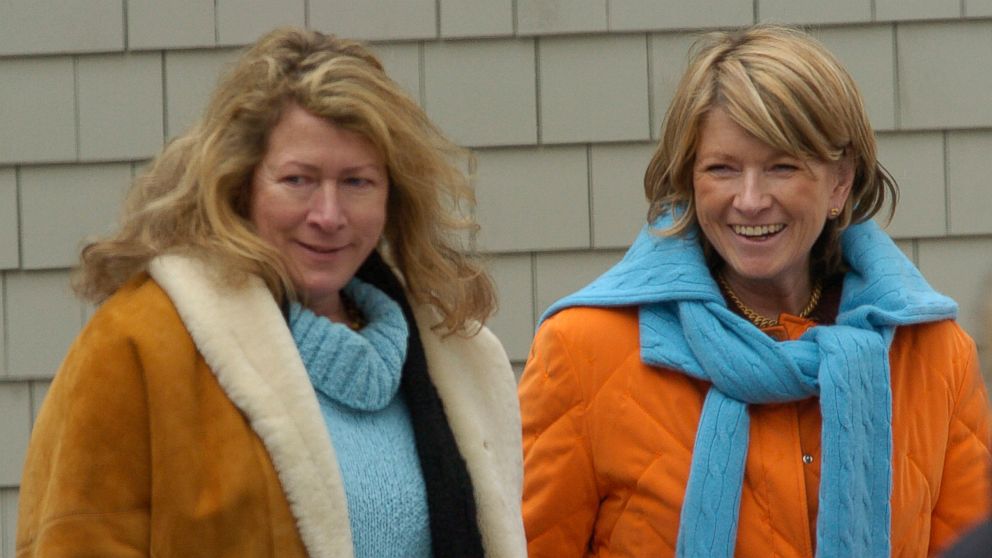 Martha Stewart, right, walks on the grounds of her estate with her sister Laura Plimpton in Bedford, New York, in this March 6, 2005, file photo. 