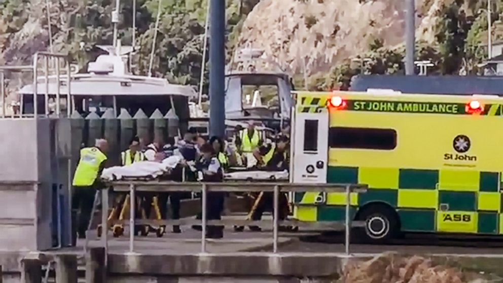 In this image made from video, injured from White Island volcanic eruption are ferried into waiting ambulances in Whakatane, New Zealand, Monday, Dec. 9, 2019. A volcano erupted Monday on a small New Zealand island frequented by tourists, and a numbe