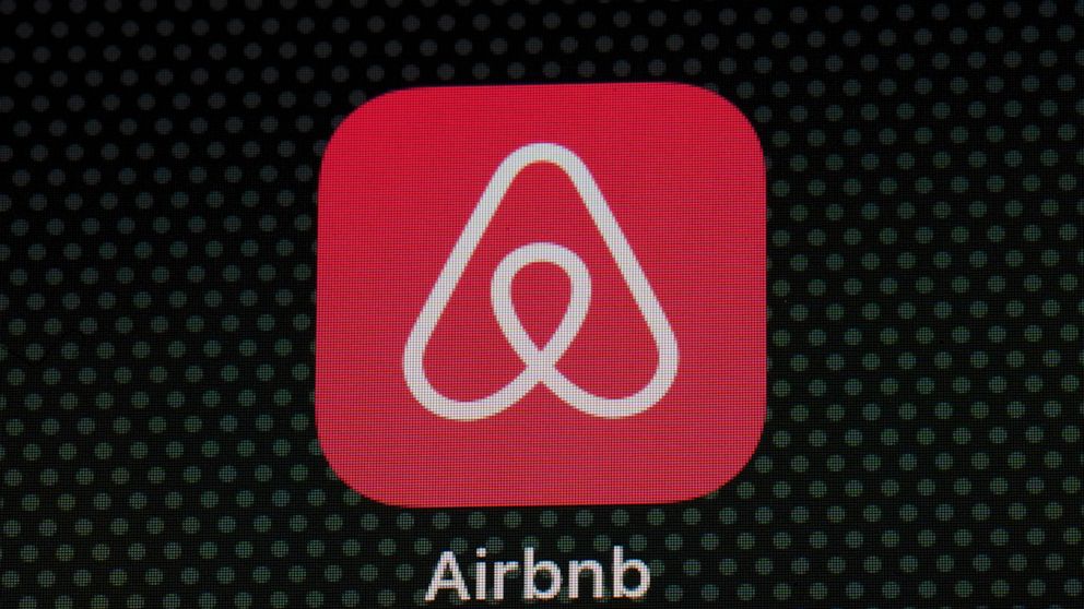 The Airbnb app icon is seen on an iPad screen, Saturday, May 8, 2021, in Washington. Airbnb reported Thursday, May 13 that its first-quarter loss more than tripled, to $1.17 billion, as travel remained depressed by the pandemic, but revenue topped th