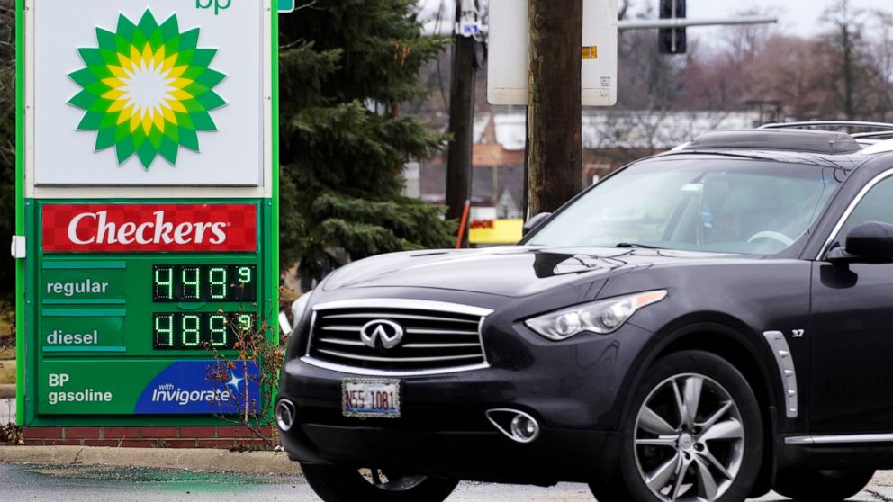 FILE - Gas prices are displayed at a BP gas station in Elgin, Ill., on March 19, 2022. Just as Americans gear up for summer road trips, the price of oil remains stubbornly high, pushing prices at the gas pump to painful heights. AAA said Tuesday, May