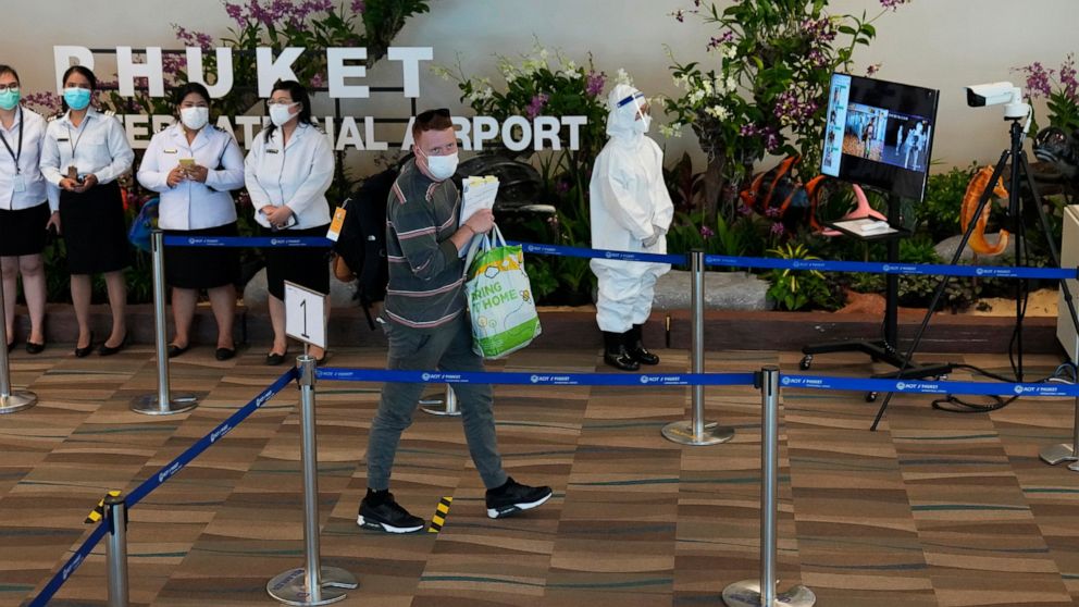 The first group of tourists from Abu Dhabi arrives at the Phuket International Airport in Phuket, Thailand, Thursday, July 1, 2021. Starting Thursday, Thailand will welcome back international visitors — as long as they are vaccinated — to its famous 