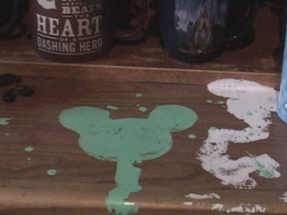 VIDEO: Some Disney fans skip the rides and search for Mickey designs hidden in the park.