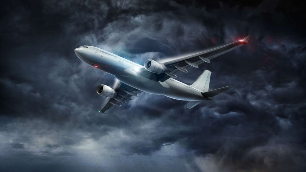 An aircraft is pictured flying during a storm in this undated stock photo.