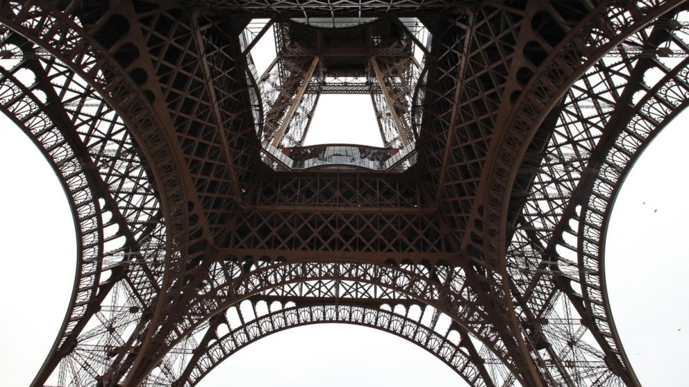 A general view looking up at the new glass floor at The Eiffel Tower during the inauguration of the newly refurbish first floor, in Paris, France, Oct. 6, 2014.
