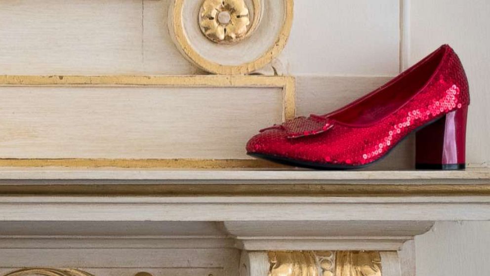 PHOTO: A replica of the famous ruby slipper sits atop the fireplace in the Judy Garland Suite at the Lenox Hotel in Boston.