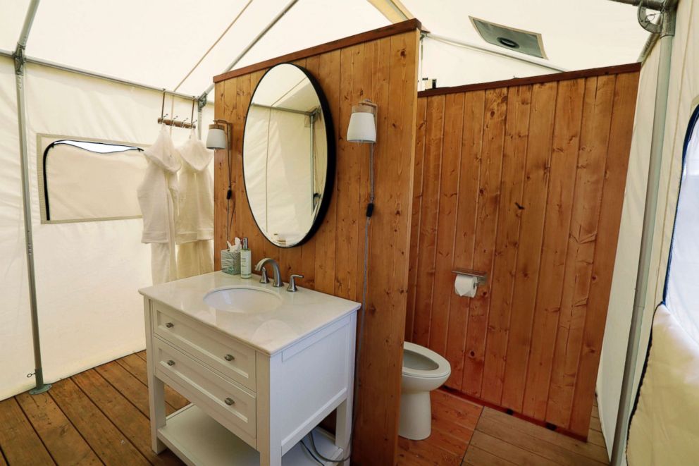   PHOTO: The private bath of one of the Collective Retreats Summit tents is shown on Governors Island in New York, July 3, 2018. 