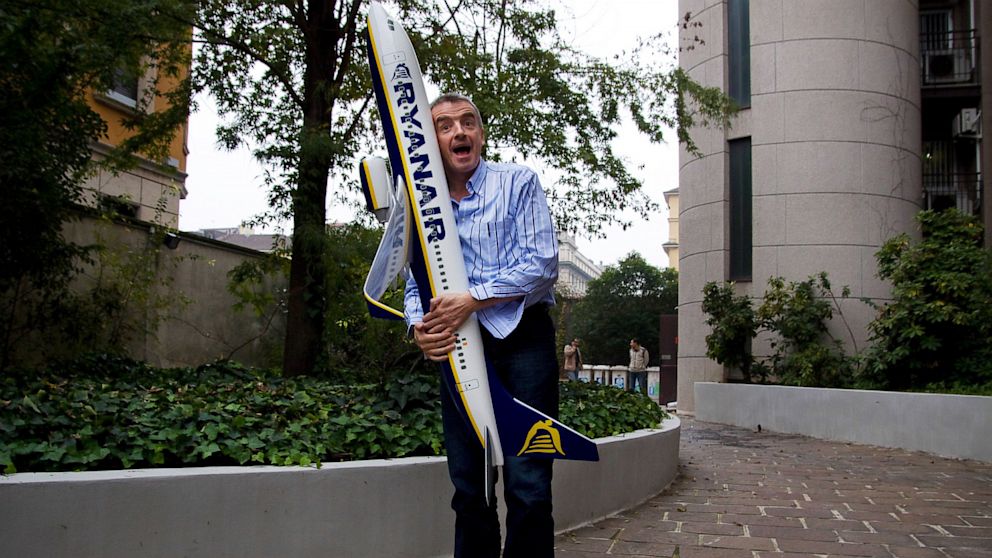 Ryanair CEO Michael O'Leary poses with a model airplane ahead of a press conference, Nov. 17, 2009 in Milan.