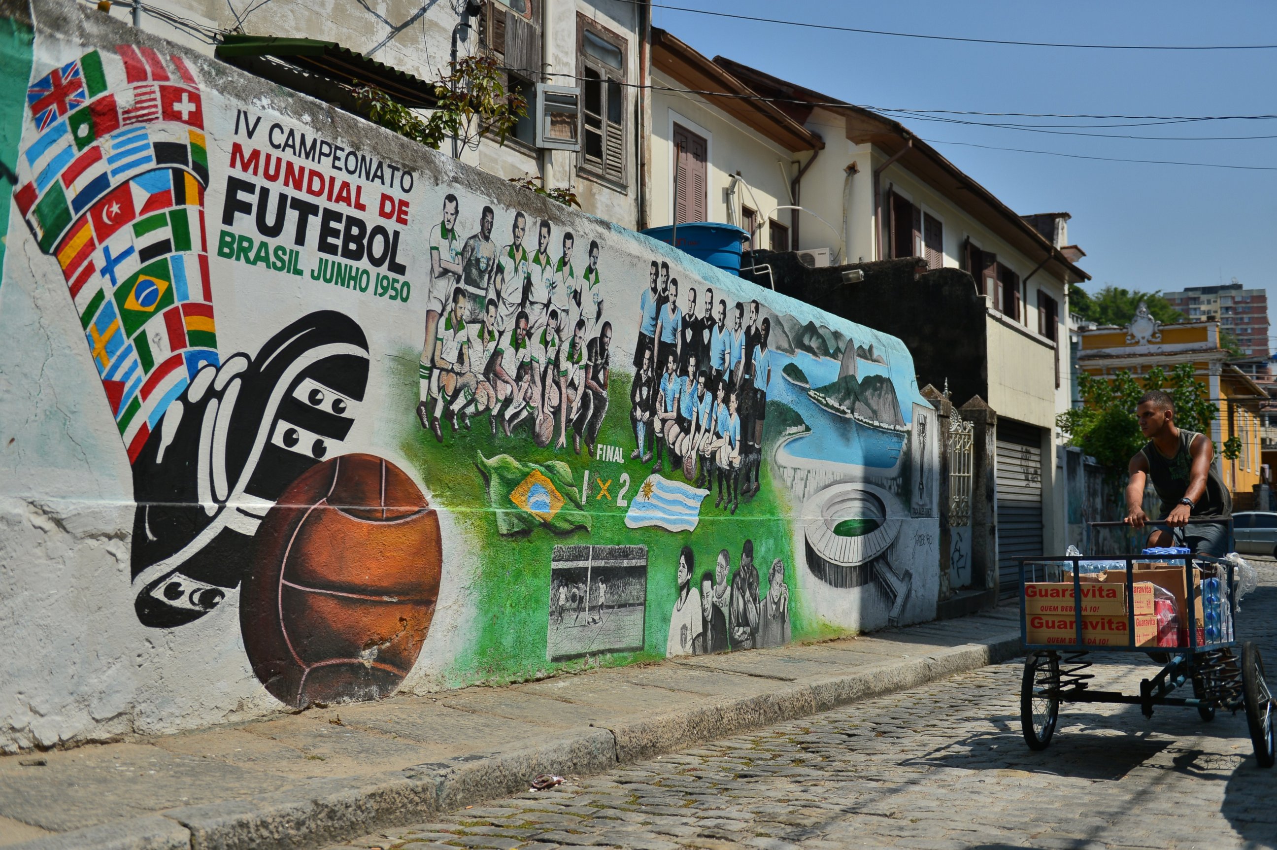 PHOTO: View of a mural paint depicting the final match of the 1950 FIFA World Cup, Brazil vs Uruguay, in Rio de Janeiro on April 8, 2014, Brazil. 