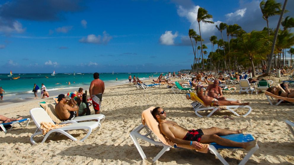 PHOTO: Tourists rest at Bavaro beach, in Punta Cana, Dominican Republic, on January 16, 2012. 