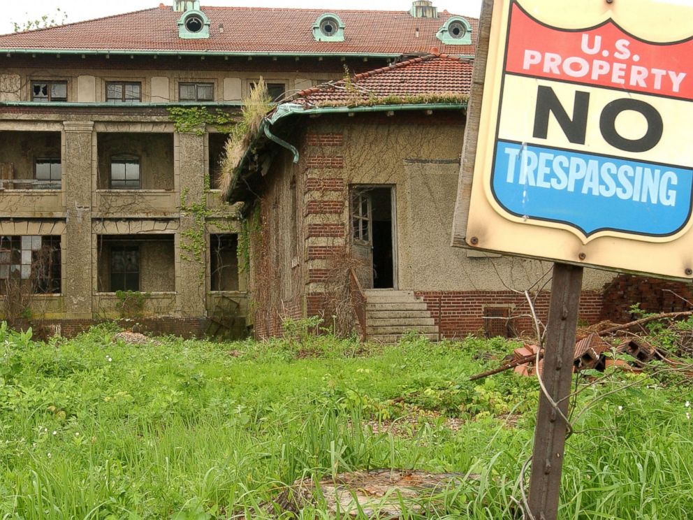 PHOTO: The dilapidated exterior of one of the Ellis Island hospital buildings is seen on June 3, 2003 in the hospital complex prior to restoration.