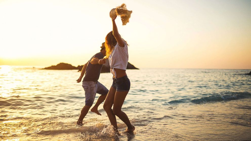 PHOTO: A couple is seen having fun by the sea in this undated stock photo.