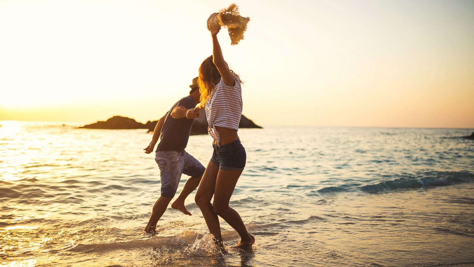 PHOTO: A couple is seen having fun by the sea in this undated stock photo.