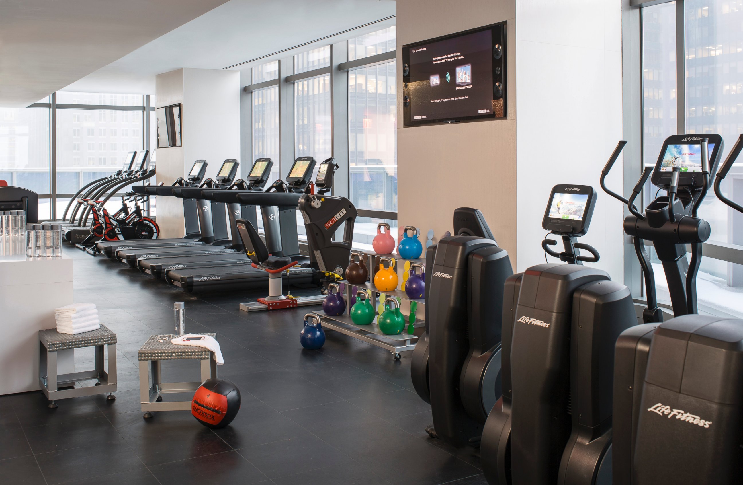 PHOTO: The fitness center on the 35th floor is shared by both brands and has floor-to-ceiling windows. 
