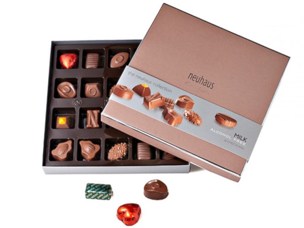 PHOTO: After dinner, Brussels Airlines passes a box of Neuhaus Belgium Chocolates to passengers in premium seating. 