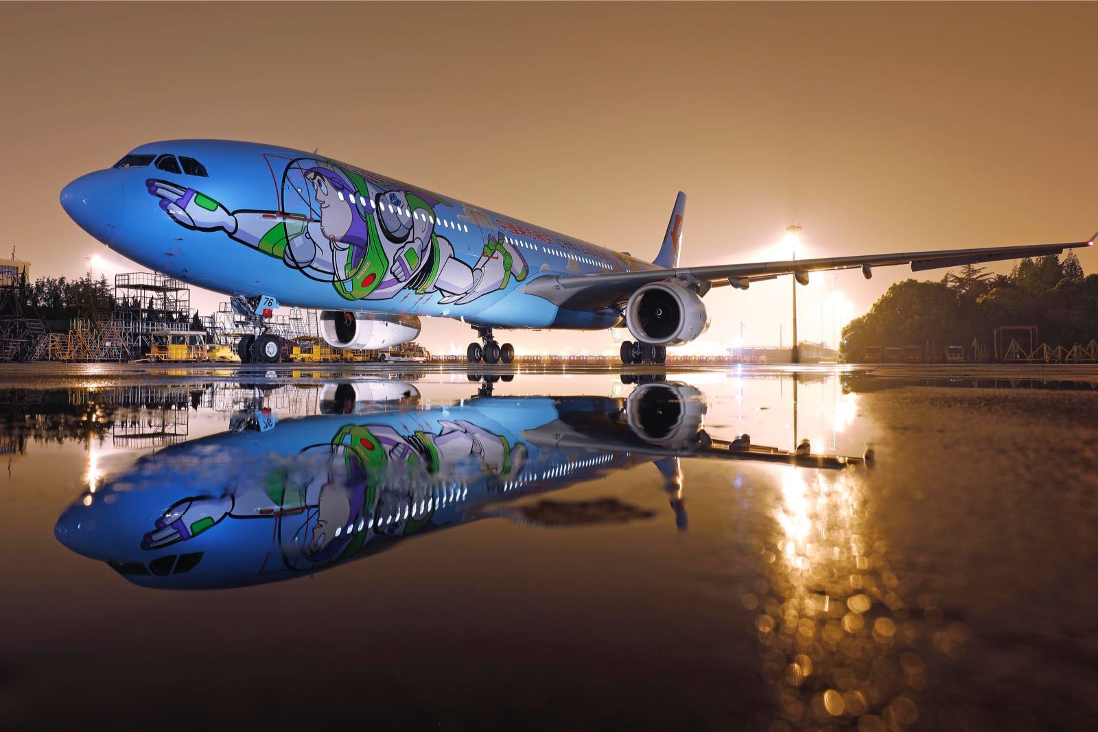 PHOTO: A Toy Story themed plane is taking off in China. The plane is a collaboration between Disney-Pixar and China Eastern Airlines. It has Buzz and Woody painted on the exterior and it  has familiar movie characters in the interior.