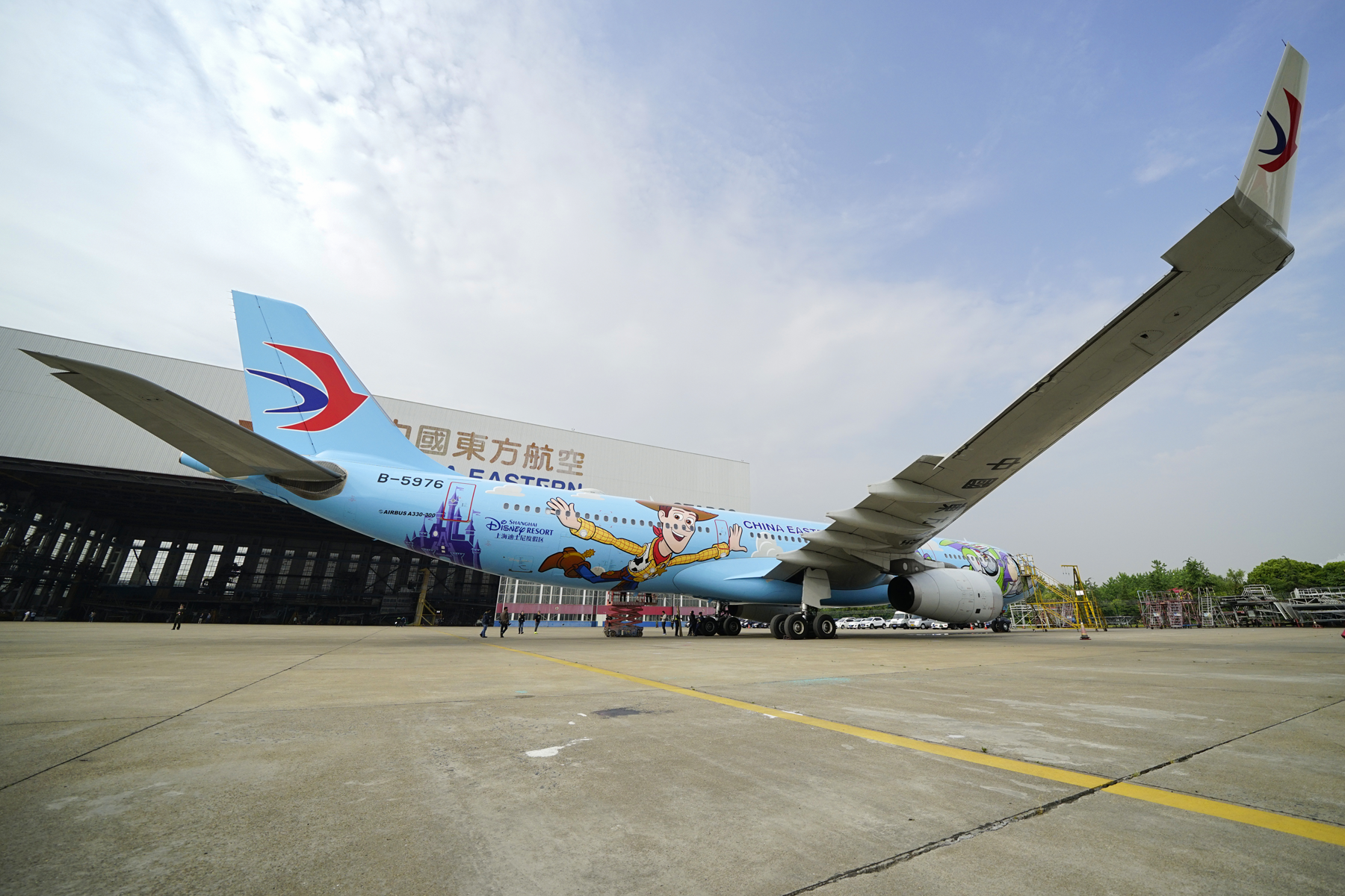 PHOTO: A Toy Story themed plane is taking off in China. The plane is a collaboration between Disney-Pixar and China Eastern Airlines. It has Buzz and Woody painted on the exterior and it  has familiar movie characters in the interior.