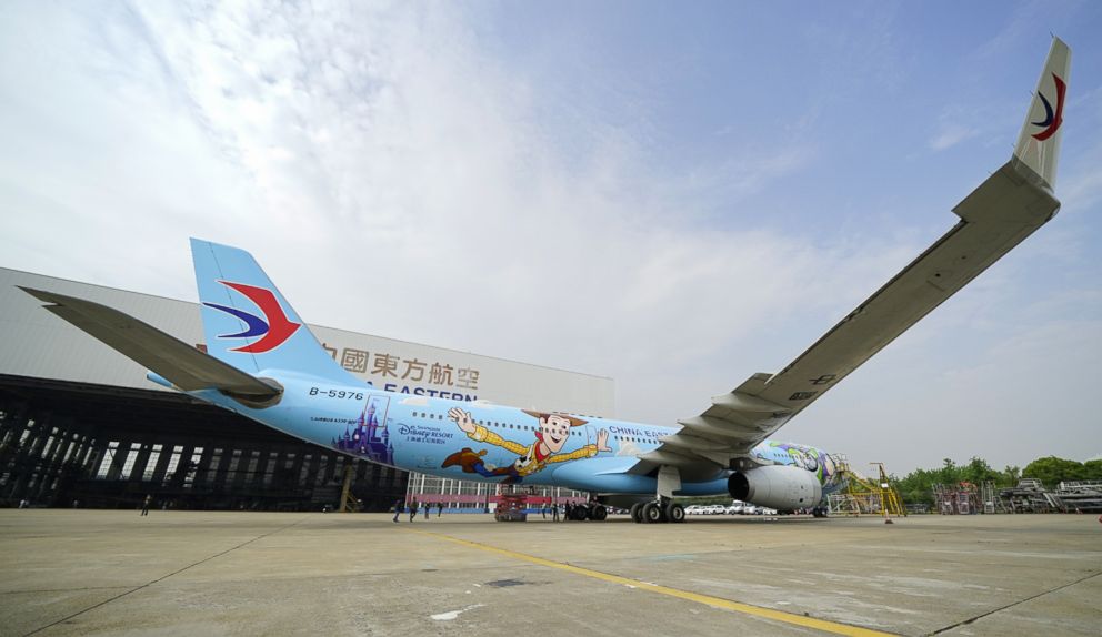 PHOTO: A Toy Story themed plane is taking off in China. The plane is a collaboration between Disney-Pixar and China Eastern Airlines. It has Buzz and Woody painted on the exterior and it  has familiar movie characters in the interior.