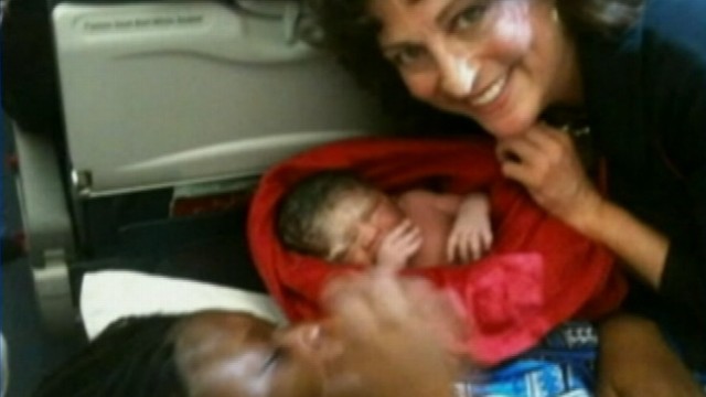 VIDEO: Flight attendant helps mom deliver new bundle of joy.