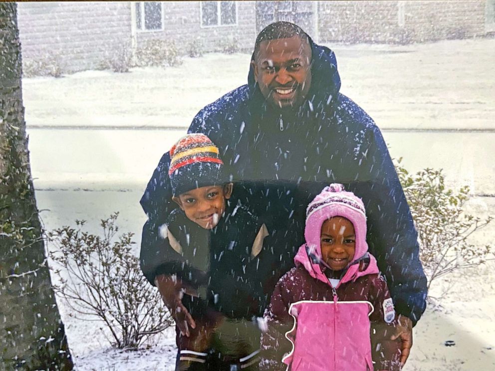 PHOTO: An undated photo of Martin Daniel with his kids Miles and Marina.