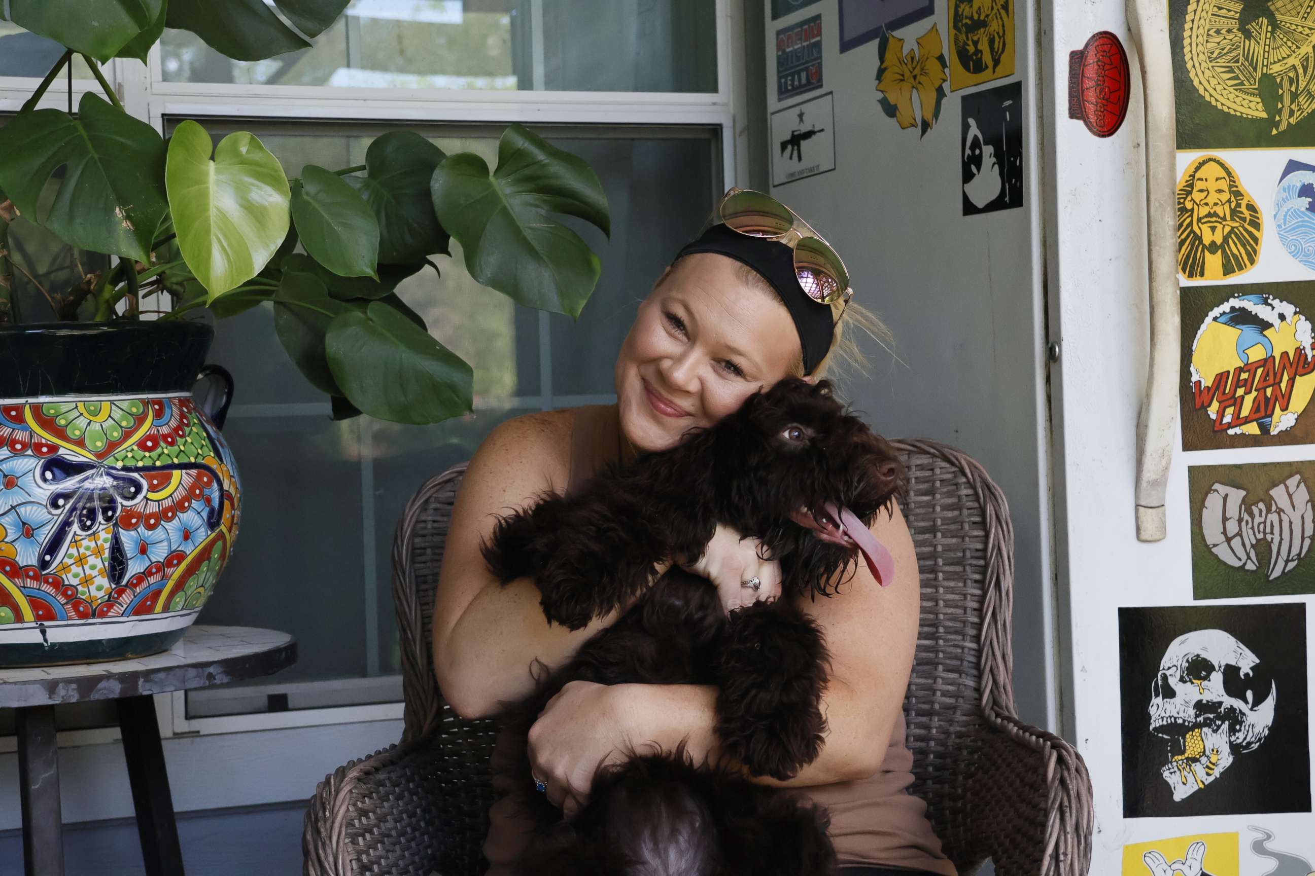 PHOTO: Khloie's mom, Jamie, holds Khloie's dog, Brownie, at a family members house on Sept. 25, 2022.