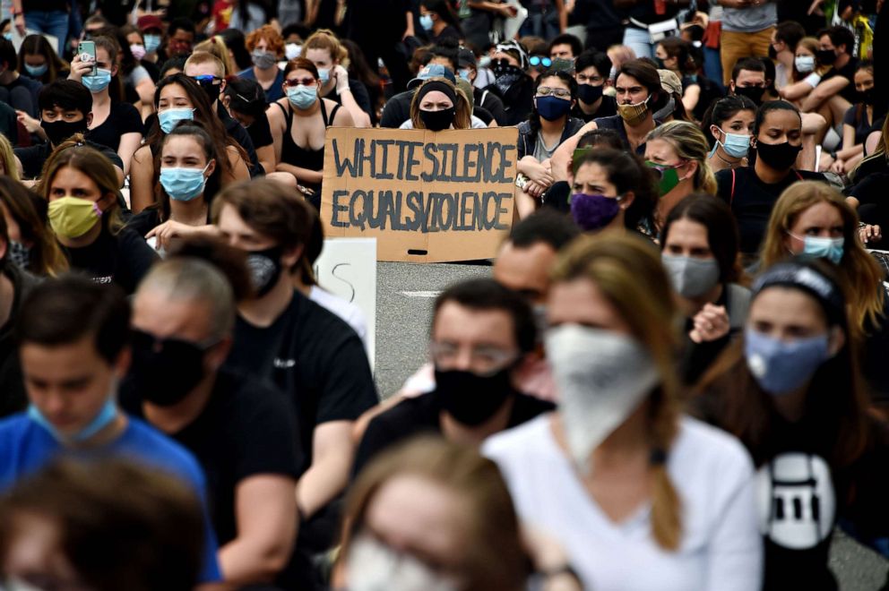 PHOTO: A peaceful group protests the death of George Floyd and racism at the Bethesda Library, on June 2, 2020, in Bethesda, Md.