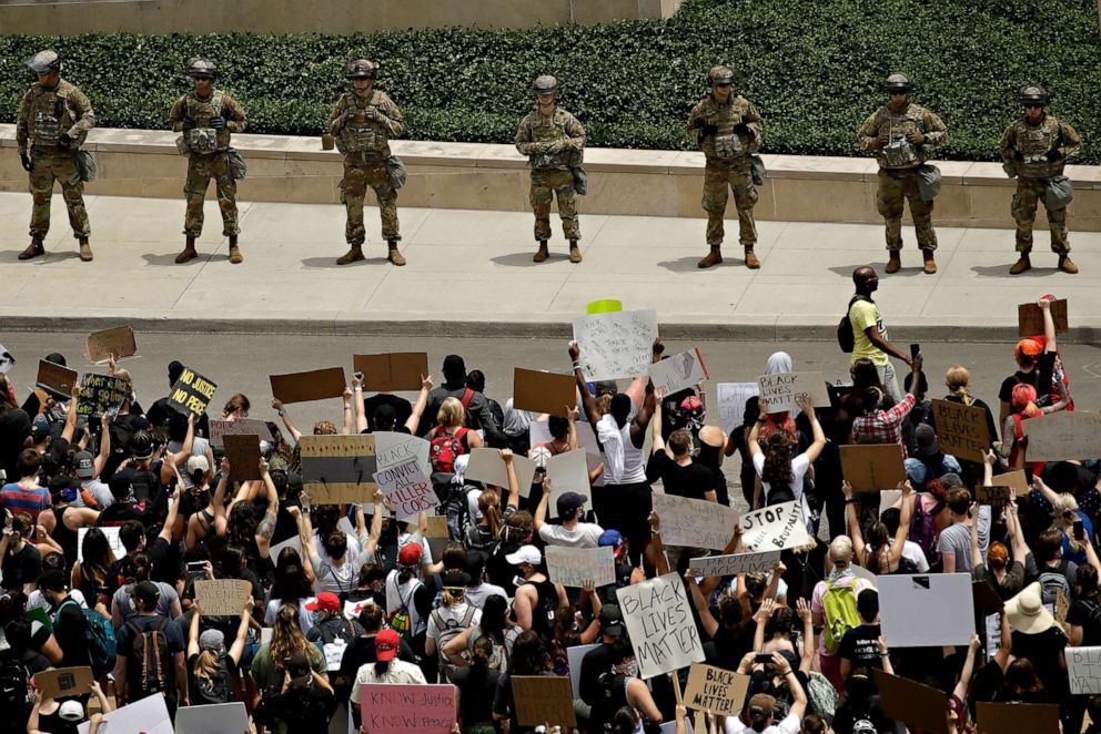 PHOTO: Demonstrators gather at police headquarters in downtown Kansas City, Mo., June 5, 2020, as they protest the death of George Floyd in Minneapolis police custody on May 25.