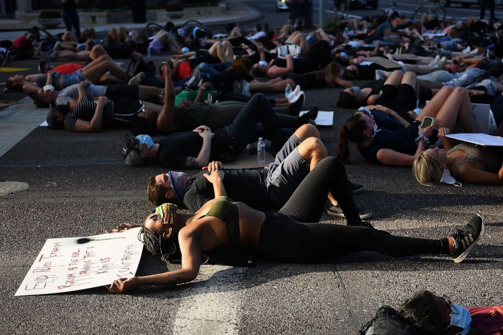 PHOTO: People take to the street to protest against police brutality, June 6, 2020, in Clayton, Mo.