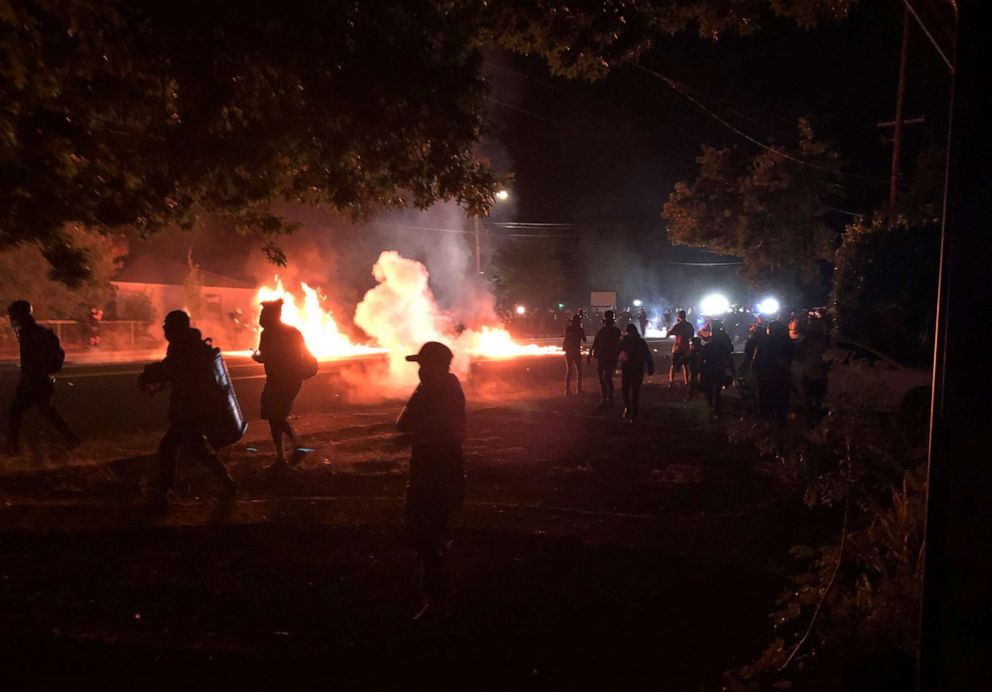 PHOTO: Flames rise from a street after a liquid had been spread and lit during protests in Portland, Oregon, on Sept. 5, 2020.