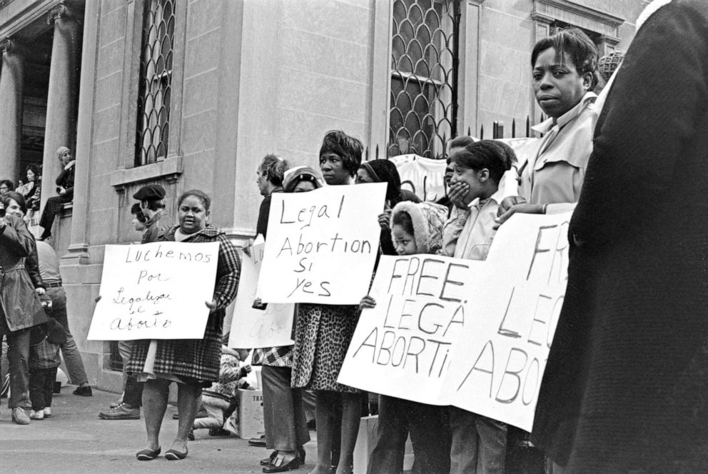 PHOTO: Protestors hold placards in Spanish reading 'luchemos por legalizar el aborto' and others in English reading 'Legal abortion si yes' and 'Free legal abortion,' protesting against New York State abortion laws, in New York City, March 28, 1970.