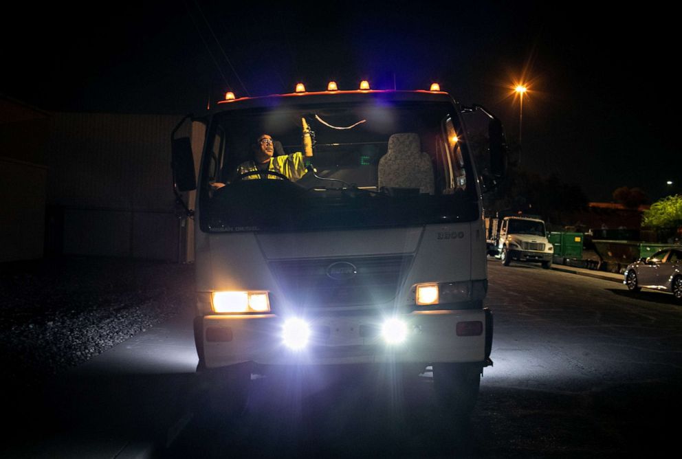 PHOTO: Hector Medrano starts his shift driving a street sweeping truck on Oct. 08, 2020 in Phoenix. This summer Medrano's work as a truck driver was sporadic due to the pandemic.