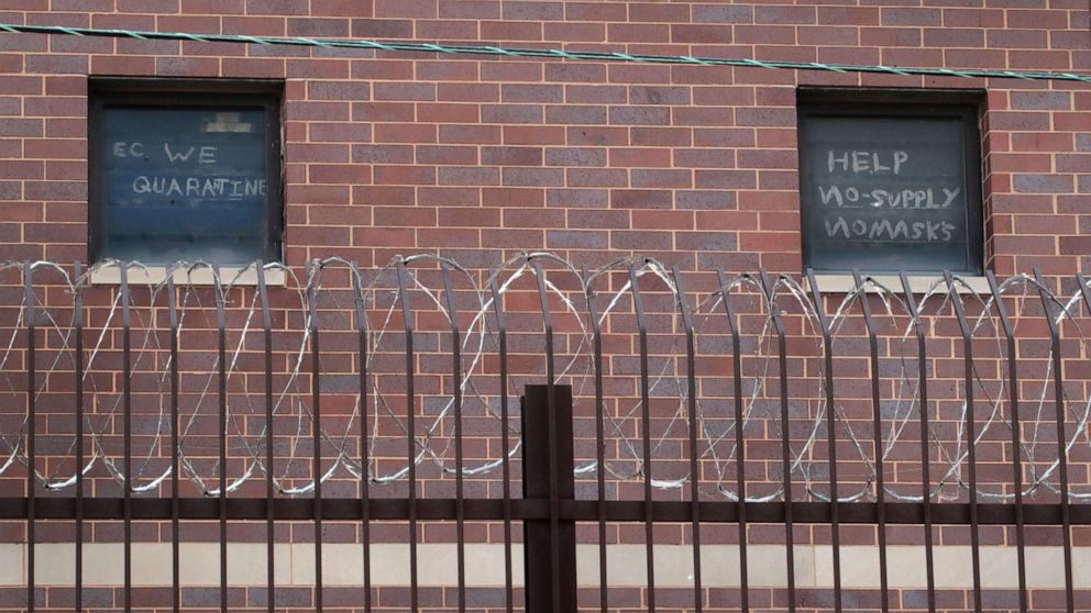 PHOTO: Signs pleading for help hang in windows at the Cook County jail on April 09, in Chicago. With nearly 400 cases of COVID-19 having been diagnosed among the inmates and employees, the jail is nations largest-known source of coronavirus infections. 