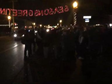 VIDEO: A group of people are chanting outside of the police station in Ferguson, Missouri.