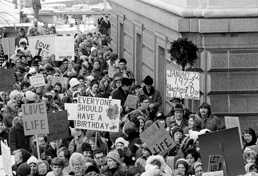 PHOTO: People march around the Minnesota Capitol building protesting the U.S. Supreme Court's Roe v. Wade decision, ruling against state laws that criminalize abortion, in St. Paul, Minn., Jan. 22, 1973.