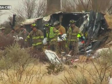 VIDEO: A Texas prison transport bus slid down an icy embankment and onto a moving train, killing eight inmates and 2 corrections officers.