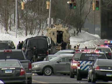 VIDEO: Authorities say the suspects remain at large after a foiled attempt to rob a Connecticut credit union while holding the manager hostage.